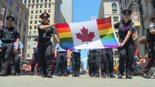 After Toronto Police were excluded from marching in the Toronto Pride Parade in uniform, they were invited to the NYC parade. tAbout 100 members marched in uniform alongside the New York Police Department on Sunday. 