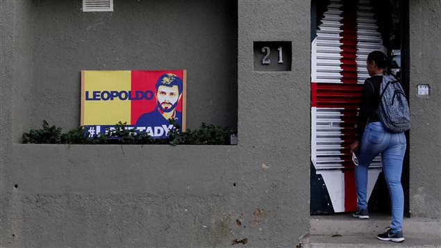 A woman enters the house of Venezuelan opposition leader Leopoldo Lopez in Caracas, Venezuela August 1, 2017. 