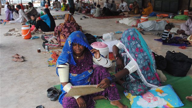 In June 25, 2015 people sat outside a hospital in Hyderabad, Pakistan where hundreds were admitted for heat stroke and dehydration. About 2,000 people died in that heat wave.