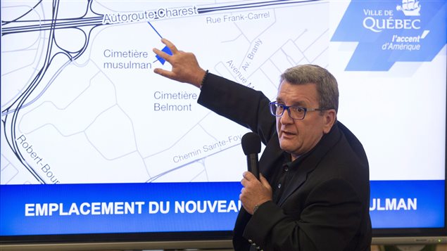 Mayor Regis Labeaume shows a map of where the Muslim cemetery will be established in Quebec City.