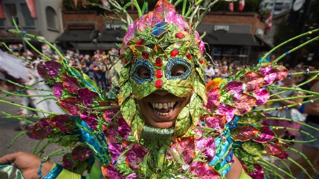 Some revelers wore elaborate masks and costumes to the Vancouver Pride Parade.