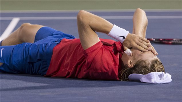 Shapovalov fell to the ground after his win against Rafael Nadal.