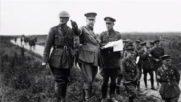 LGen Arthur Currie (centre). As he had done before Currie went to the area to get a first hand analysis, and determined the British plan to attack Lens would be a disaster, instead he insisted on caputring the high ground nearby at Loos, a strategic advantage.