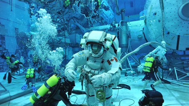 Part of the astronaut school training includes preparation for spacewalks. Here CSA Astronaut David Saint-Jacques during his first spacewalk training at NASA’s Neutral Buoyancy Laboratory (NBL) in Houston, Texas. 