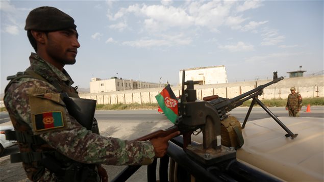 An Afghan National Army (ANA) soldier keeps watch at a checkpoint in Kabul, Afghanistan, August 22, 2017.