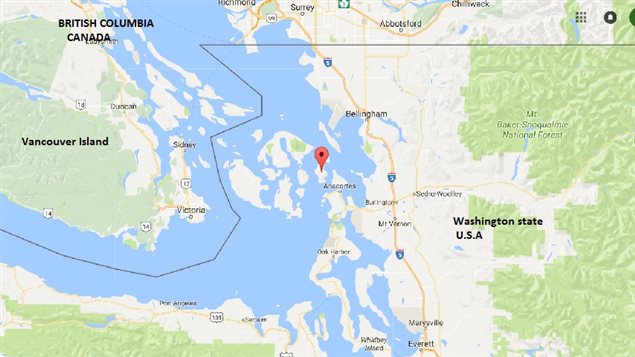 Red balloon indicates Cypress Island where the Cooke firsh farm nets are located.