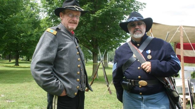 Grays and Blues of Montreal members Rob McLachlan, left, and Vince Chiarelli, right, say they don’t represent the North or South, but just the Canadians who fought in the Civil War. 