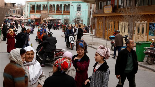 People mingle in the old town of Kashgar, Xinjiang Uighur Autonomous Region, China, March 22, 2017.