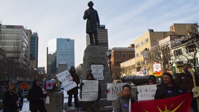 About a dozen aboriginal rights advocates staged a protest in front of Sir John A. Macdonald’s statue in Hamilton in January 2015, the politician’s 200th birthday. 