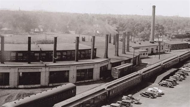 London Ontario roundhouse circa 1949. Note the large stacks at each bay for smoke from steam engines or recent technology diesels could be exhausted outside the building.  Once quite numerous across the country, there are only a tiny handful of these structures remaining.