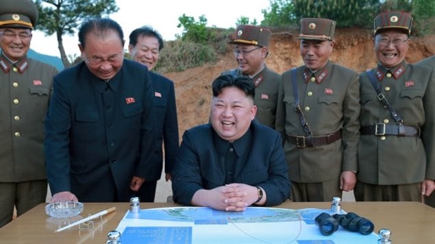 North Korean leader Kim Jong-un, shares a laugh during a recent test of a long-range strategic ballistic rocket in this photo released by North Korea’s Korean Central News Agency (KCNA). Experts say North Korea might be preparing more provocative weapons tests. 