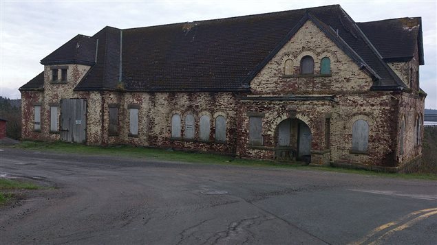 The derelict Commercial Cable Building in 2013. Although it looks solid, engineers were concerned at the time, and this summer declared in unsafe and not restorable.