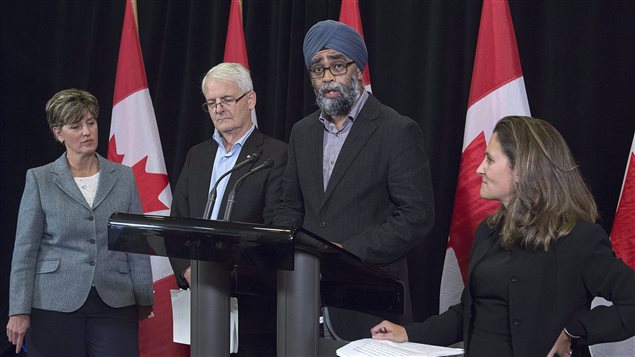 International Development Minister Marie-Claude Bibeau, Transport Minister Marc Garneau, Defence Minister Harjit Sajjan and Foreign Affairs Minister Chrystia Freeland, left to right, talk to reporters about disaster relief as the Liberal cabinet meets in St. John’s, N.L. on Tuesday, Sept. 12, 2017.