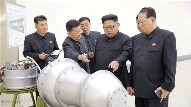 North Korean leader Kim Jong Un provides guidance with Ri Hong Sop (2nd L) and Hong Sung Mu (R) on a nuclear weapons program in this undated photo released by North Korea’s Korean Central News Agency (KCNA) in Pyongyang September 3, 2017. 