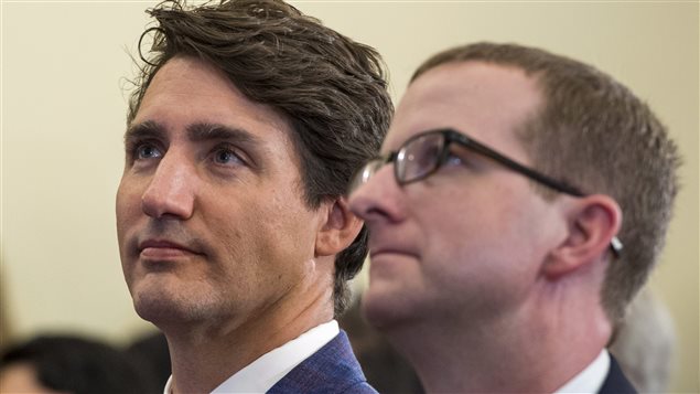 Prime Minister Justin Trudeau, left, and Mike Schroepfer, chief technology officer at Facebook, listen to speeches during the launching an artificial intelligence research lab Friday, September 15, 2017 in Montreal. 