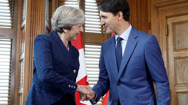 Theresa May et Justin Trudeau
