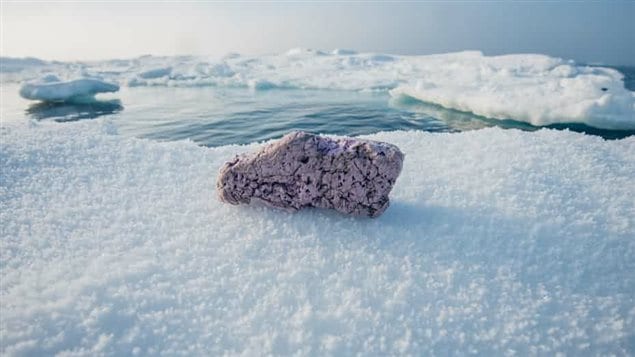 Plastic pollution on an ice floe in the middle of the Arctic Ocean. One of the weathered blocks of styrofoam found in the high Arctic, where year-round ice had historically prevented any ship travel