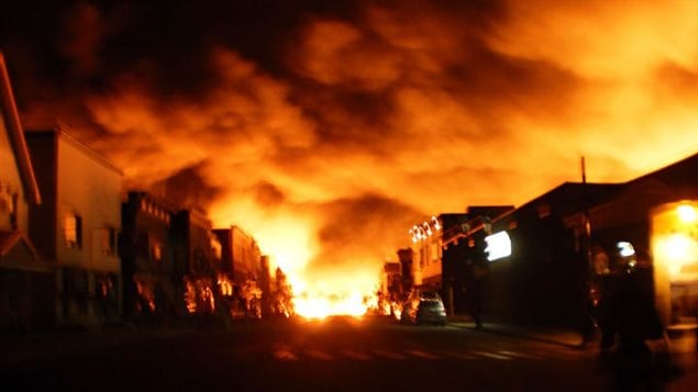Lac-Mégantic's main street engulfed in flames on July 6, 2013. The centre of the small Quebec town was destroyed and 47 people died. 