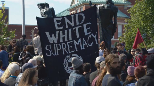 Hundreds of counter-protestors turned out to rally against a planned anti-immigration protest, While most were peaceful a smaller group wore masks and carried red flags. One counter protester has been charged with assault and another may face criminal charges