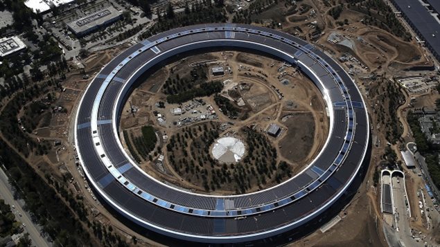 An aerial view in April of Apple’s new headquarters in Cupertino, Calif. Designed by Lord Norman Foster and costing about $5 billion, it will house 13,000 employees in 2.8 million square feet of space with 80 acres of parking for 11,000 cars
