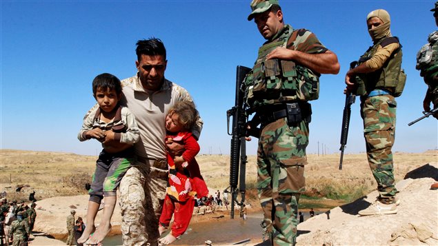 Los combates obligaron a buena parte de la población a huir de Hawija.