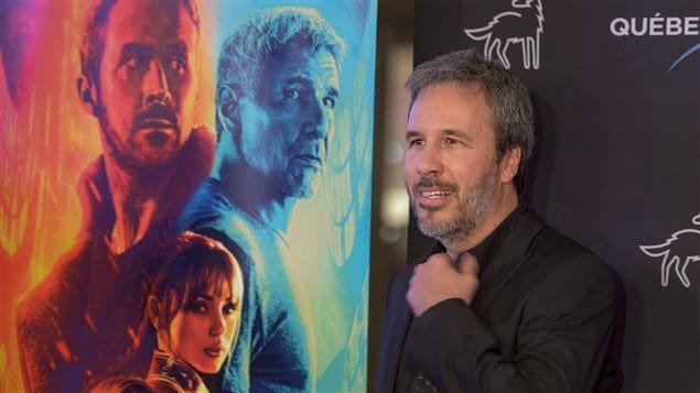Director Denis Villeneuve arrives on the red carpet for the Canadian premiere of "Blade Runner 2049" in Montreal on Wednesday, the day after his 50th birthday.