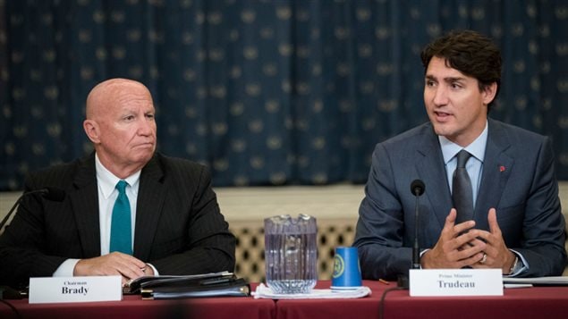 (L to R) Committee chairman Rep. Kevin Brady (R-TX) looks on as Prime Minister of Canada Justin Trudeau speaks during a meeting with the House Ways and Means Committee, October 11, 2017 in Washington, DC. 