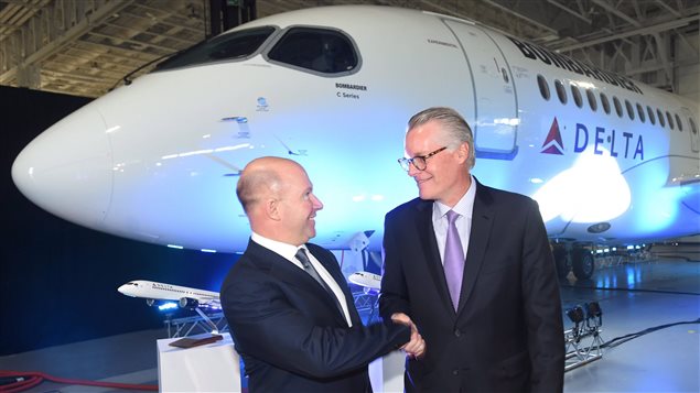 Bombardier’s Alain Bellemare (left) shook hands with Delta Air Lines’ Ed Bastian over the U.S. firm’s order for 75 C-series jets in April 2016. Recently, the U.S. said it would impose a duty of 300 per cent on the jets.