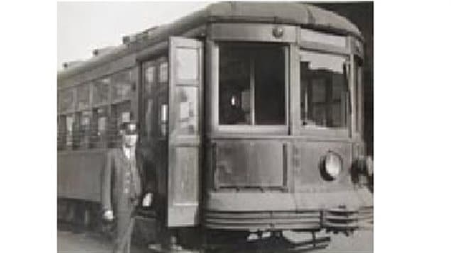 date unknown: *Streetcar conductor, Mr. Patrick Sr., ready to start work on the Erie Street line* 