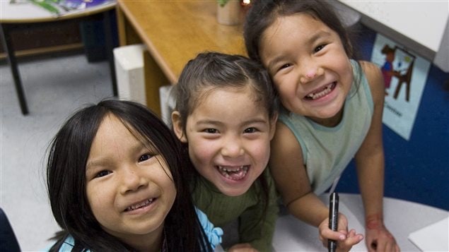 Suzie Rich, Chenille Rich and Jenny Mistenapeo, left to right, kindergarten students at Mushuau Innu Natuashish School in the northern Labrador community of Natuashish, N.L., work on an art project on Thursday, Dec. 6, 2007. 