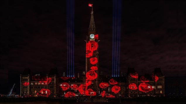 The *poppy drop* 117,000 images of poppies slowly cascade down Canada’s Parliament buildings, each one representin a Canadian solider who paid the ultimated sarifice in war and conflicts since the beginning of the First World War.