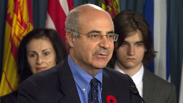 Sergei Magnitsky’s son Nikita Magnitsky and his mother, Natalia look on as Bill Browder responds to a question during a news conference on Parliament Hill in Ottawa, Wednesday November 1, 2017.