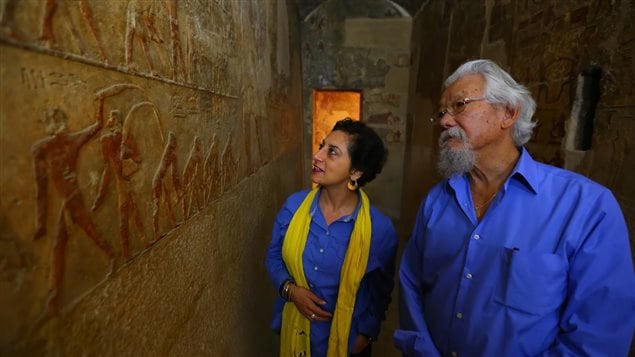 Documentary host Dr.David Suzuki inspects carvings with Egyptologist Salima Ikram in the tomb of Imery