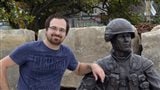 The artist, Tyler Fauvelle, with his latest bronze sculpture.