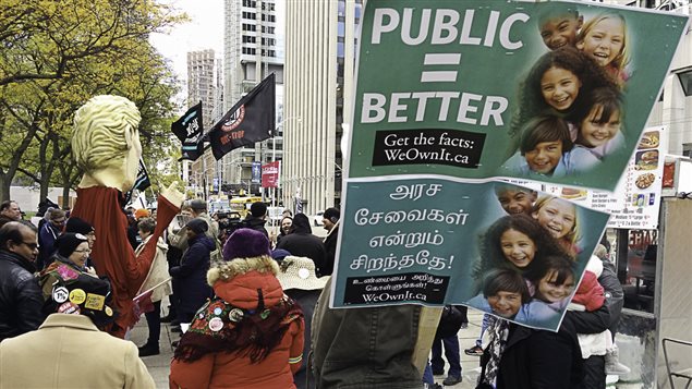 OPSEU’s *We Own It* rally in downtown Toronto near a business conference for industry on how to get the most of P3 contracts