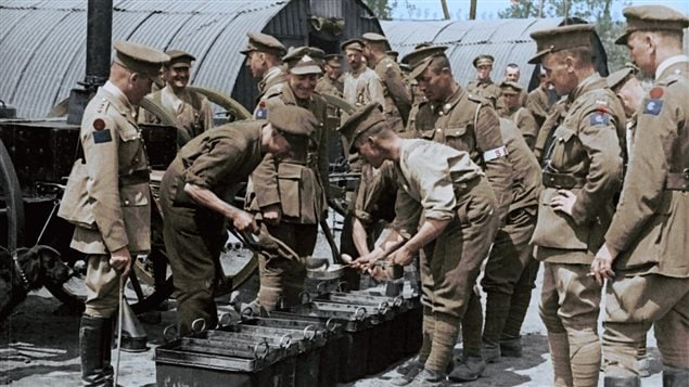 Meal time. The government sent cameramen along with the troops to capture films of soldiers lives to be shown to the public...but not actual battle scenes. films were restored and colourized for this new compilation presentation, and in a unique blend of sketches and film and narrative.