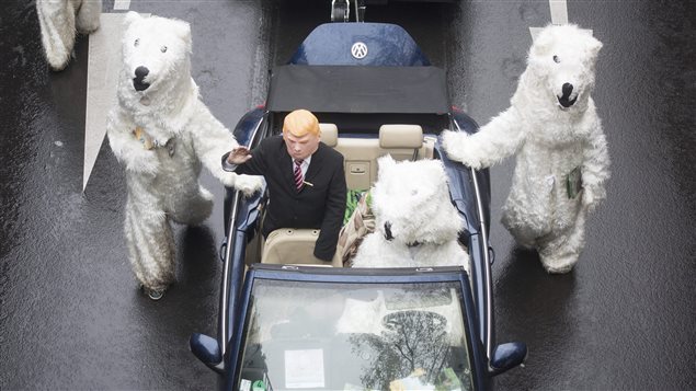 Demonstrators dressed up as U.S. President Donald Trump and polar bears protest climate change during the climate conference in Bonn, Germany on Nov. 11, 2017. 