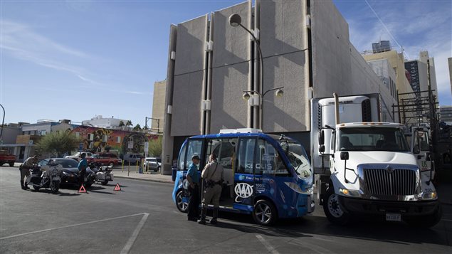 A truck backed up and hit a self-driving shuttle shortly after the launch of the automated ride service in Las Vegas, U.S.