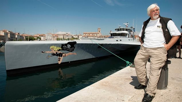 Sea Shepherd founder Captain Paul Watson. near one of he group’s ships. His group has adopted a policy of*direct action* which seems to work better and faster than words and banners.