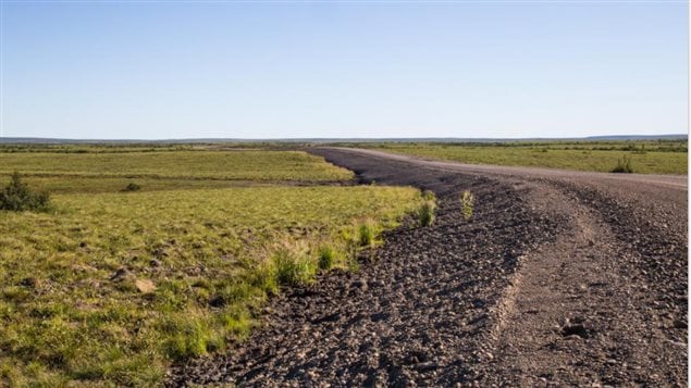 The new road surface has to be about 1.5m above ground so as to insulate the permafrost underneat