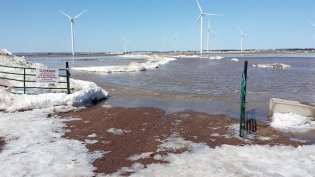 Water is beginning to breach the dikes near the Amherst Community Wind Farm. 