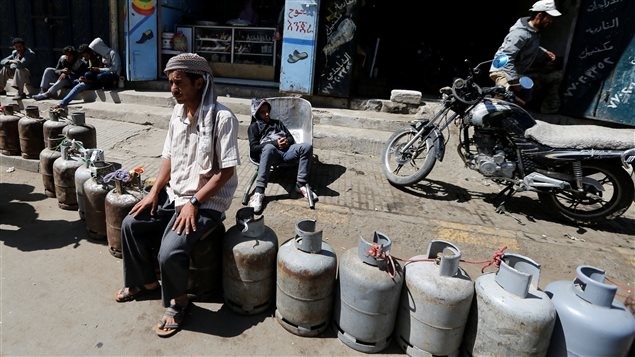 Cooking gas cylinders are lined up outside a gas station amid supply shortage in Sanaa, Yemen November 7, 2017.