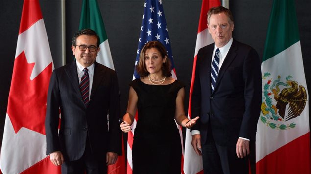 Minister of Foreign Affairs Chrystia Freeland meets for a trilateral meeting with Mexico's Secretary of Economy Ildefonso Guajardo Villarreal, left, and Ambassador Robert E. Lighthizer, United States Trade Representative, during the final day of the third round of NAFTA negotiations at Global Affairs Canada in Ottawa on Wednesday, Sept. 27, 2017. A new report concludes the end of the North American Free Trade Agreement would trim just over half a percentage point from Canada's economy.