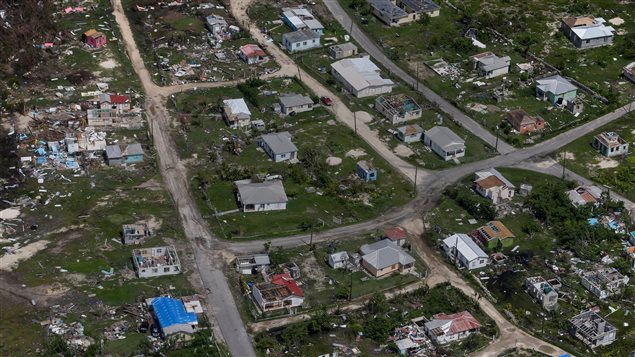Houses are seen in ruins in Codrington on the island of Barbuda just after a month after Hurricane Irma struck the Caribbean islands of Antigua and Barbuda, October 7, 2017.