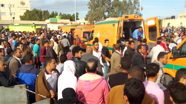 Egyptians gather around ambulances following a gun and bombing attack on the Rawda mosque near the North Sinai provincial capital of El-Arish on November 24, 2017. Armed attackers killed at least 235 worshippers in a bomb and gun assault on the packed mosque in Egypt’s restive North Sinai province, in the country’s deadliest attack in recent memory. 