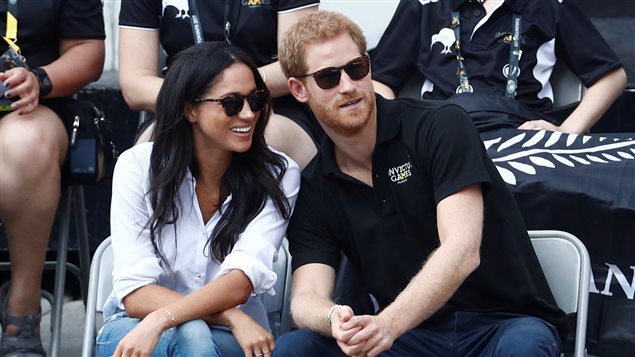 Prince Harry sits with girlfriend actress Meghan Markle to watch a wheelchair tennis event during the Invictus Games in Toronto, Ontario, Canada September 25, 2017.