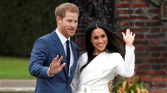 Prince Harry poses with Meghan Markle in the Sunken Garden of Kensington Palace, London, Britain, November 27, 2017.