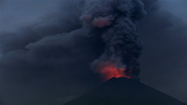 Glowing light of hot lava is seen during the eruption of Mount Agung as seen from Amed in Karangasem, Bali, Indonesia, November 27, 2017. 