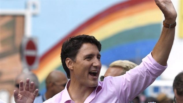 Prime Minister Justin Trudeau marches in the Ottawa Capital Pride parade, Sunday, Aug. 27, 2017. The apology from Trudeau for past state-sanctioned discrimination against LGBTQ people is welcome news for those who have been calling for such an expression of regret, but some think he is not the only one who should be there.
