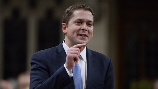 Conservative Leader Andrew Scheer has escalated the attack on the finance minister by asking for his resignation.